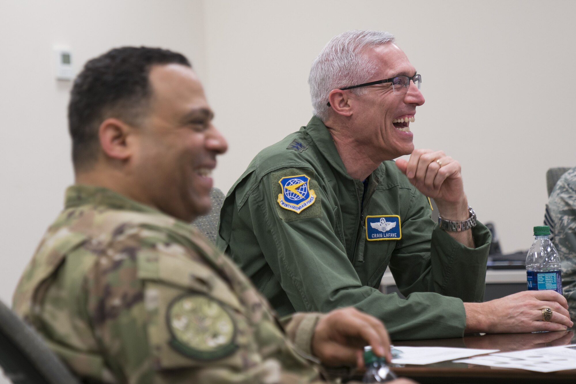 Maj. Gen. Craig La Fave, 22nd Air Force commander, shares a laugh with members of the 413th Flight Test Group during a unit visit Feb. 2, 2018, at Robins Air Force Base, Georgia. During his stay, La Fave got a first-hand look at the 413th FTG mission and discussed topics on various, current Air Force Reserve affairs. (U.S. Air Force photo by Jamal D. Sutter)