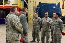 U.S. Air Force Tech. Sgt. Williams Rangel and members of the 819th Rapid Engineer Deployable Heavy Operational Repair Squadron Engineers (RED HORSE) readiness section brief Maj. Gen. Scott J. Zobrist, 9th Air Force commander, and Chief Master Sgt. David W. Wade, 9th AF command chief, at Malmstrom Air Force Base, Mont., Jan. 25, 2018. The readiness section is preparing approximately 180 RED HORSE Airmen for deployment this spring. During their visit, 9th AF leadership met with 819th RHS, base leaders and Airmen for a mission update and to thank them for their support to 9th AF and worldwide contributions, including upcoming deployments to U.S. Africa Command and U.S. Central Command.