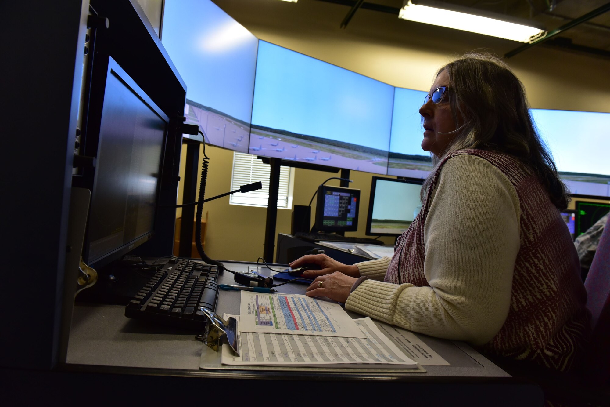Airmen perform training using simulations in the air traffic control tower.