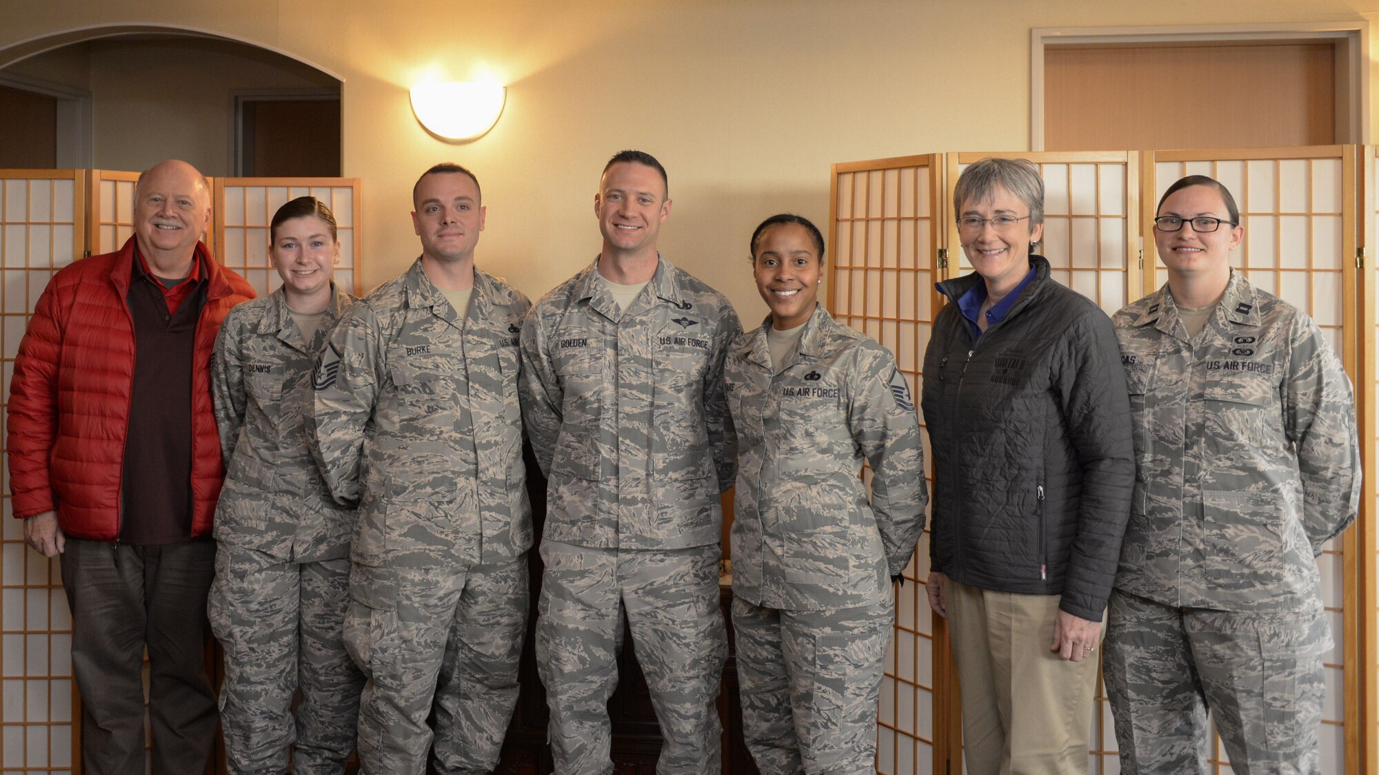 Secretary of the Air Force Heather Wilson poses with Airmen, Feb. 1, 2018, at Yokota Air Base, Japan.
