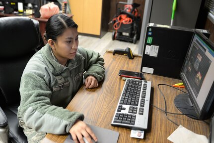 Airman 1st Class Alexandra Terry, a 773d Logistics Readiness Squadron Documented Cargo vehicle operator, works on a computer-based training before her next scheduled delivery Feb. 2, 2018, at Joint Base Elmendorf-Richardson. A Documented Cargo vehicle operator delivers cargo to the customer using scheduled delivery/pick-up sweeps throughout the installation.