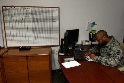 Air Force Staff Sgt. Daniel Shobe, a 773d Logistics Readiness Squadron Training Validation Operations assistant noncommissioned officer in charge checks an Airman’s training record Feb. 2, 2018, at Joint Base Elmendorf-Richardson, Alaska. Training Validations Operations manages all aspects of personnel, vehicle and equipment training.
