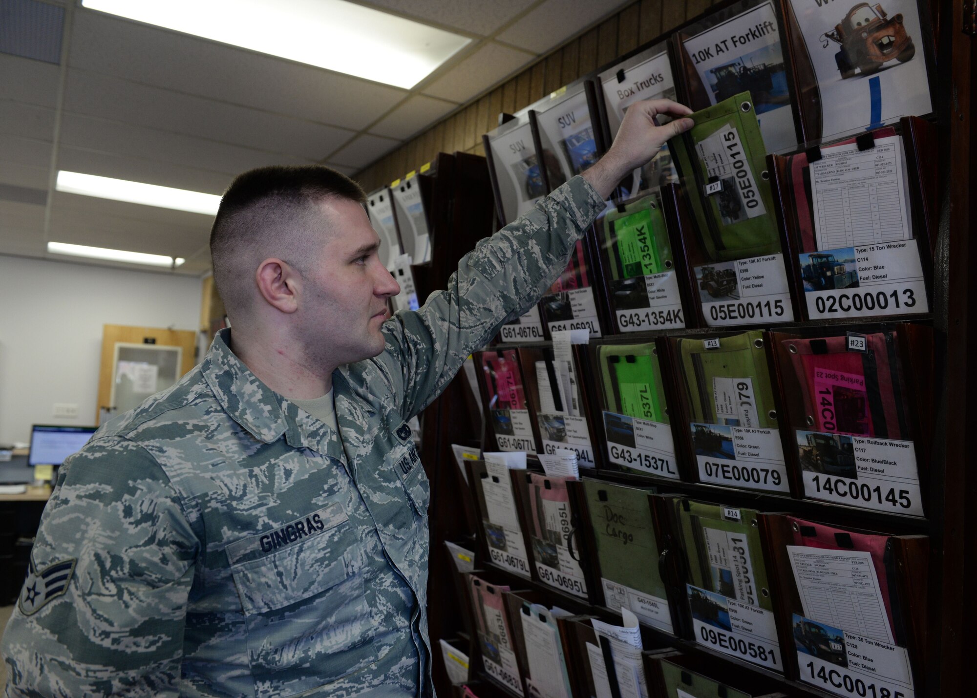 Senior Airman Justin Gingras, a 773d Logistics Readiness Squadron Vehicle Operation Control Center dispatcher, selects a forklift Feb. 2, 2018, at Joint Base Elmendorf-Richardson, Alaska. The VOCC ensures qualified vehicle operators are available to support all transportation requests.