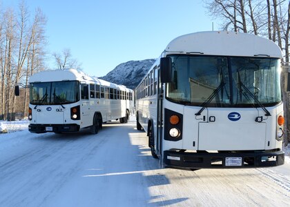 Airmen with the 773d Logistics Readiness Squadron Vehicle Operation Control Center move busses  Feb. 2, 2018, at Joint Base Elmendorf-Richardson, Alaska. The VOCC ensures qualified vehicle operators are available to support all transportation requests. Within the VOCC is an additional area, Operator Records and Licensing, which is responsible for all motor vehicle operator records for military and civilian personnel authorized to operate Air Force - owned, rented or leased vehicles.