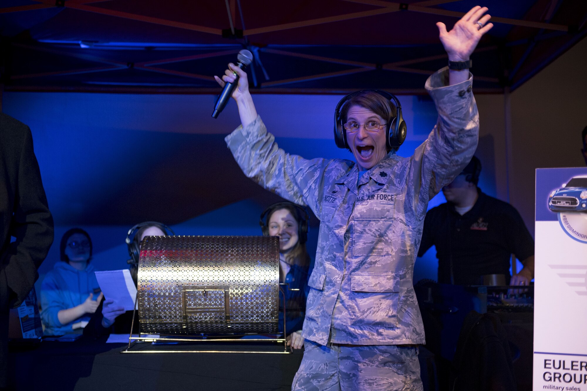 U.S. Air Force Lt. Col. Renee Thuotte, 86th Force Support Squadron commander, cheers during the Year of Giving Back Finale at the Enlisted Club on Ramstein Air Base, Germany, Feb. 2, 2018. The Year of Giving Back campaign consisted of 86 events spread out over the course of 2017 dedicated to giving back to the Kaiserslautern Military Community. (U.S. Air Force photo by Senior Airman Devin Boyer)