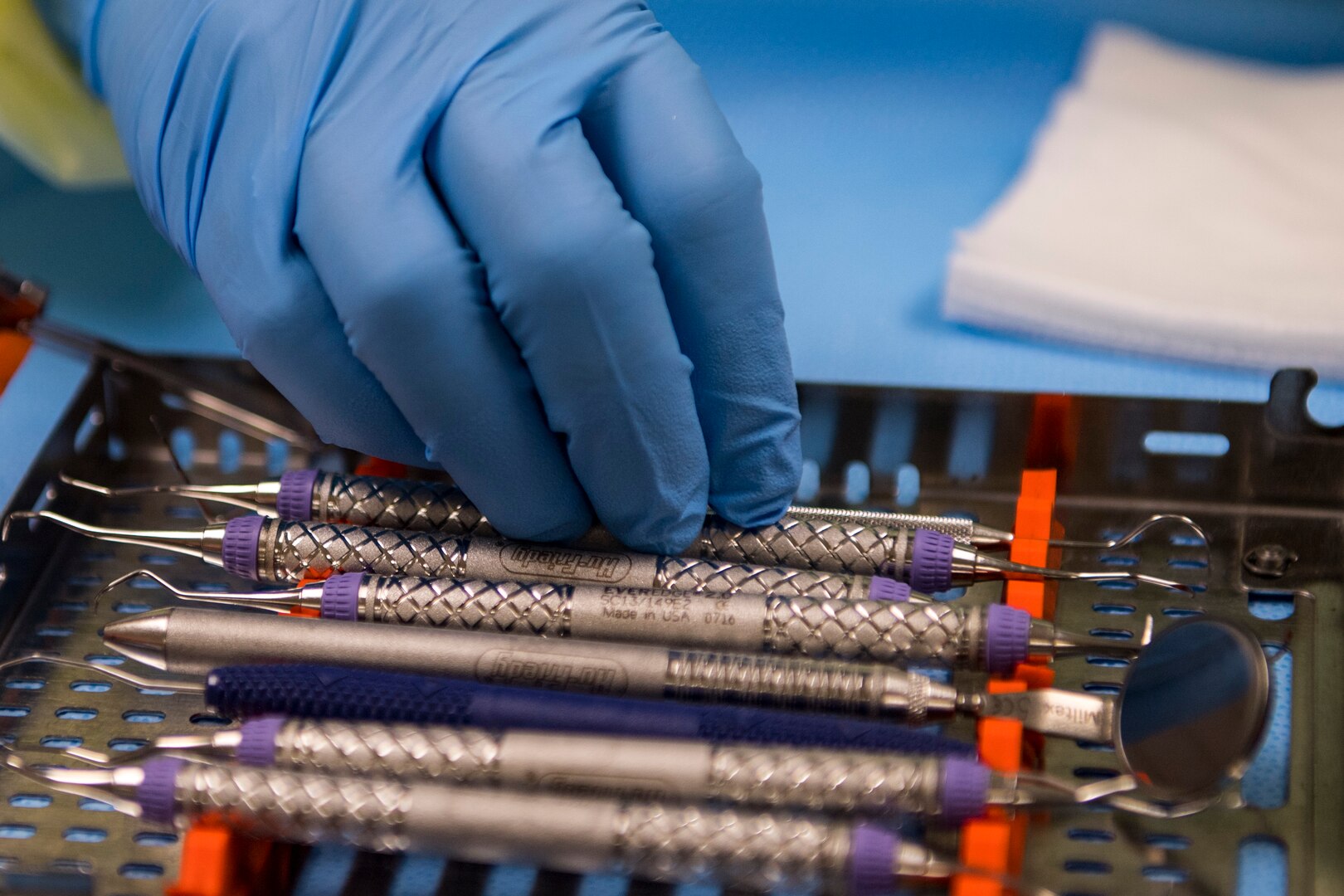 Saundra Pittman, 23d Aerospace Medical Squadron Central Instrument Processing Center (CIPC) technician, checks dental instruments for debris, Jan. 19, 2018, at Moody Air Force Base, Ga. CIPC technicians are responsible for ensuring all instruments used on patients within the 23d Medical Group are properly sterilized. They wrap the instruments with sensors to ensure the sterilizer reaches proper temperatures and the instruments remain sterile until use. (U.S. Air Force photo by Senior Airman Janiqua P. Robinson)