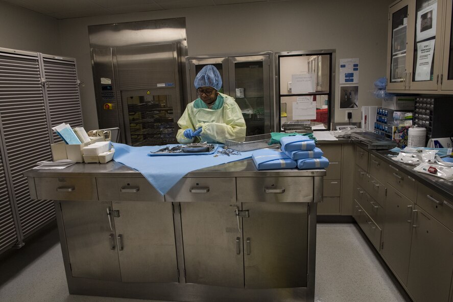 Saundra Pittman, 23d Aerospace Medical Squadron Central Instrument Processing Center (CIPC) technician, prepares to wrap surgical instruments, Jan. 19, 2018, at Moody Air Force Base, Ga. CIPC technicians are responsible for ensuring all instruments used on patients within the 23d Medical Group are properly sterilized. They wrap the instruments with sensors to ensure the sterilizer reaches proper temperatures and the instruments remain sterile until use. (U.S. Air Force photo by Senior Airman Janiqua P. Robinson)