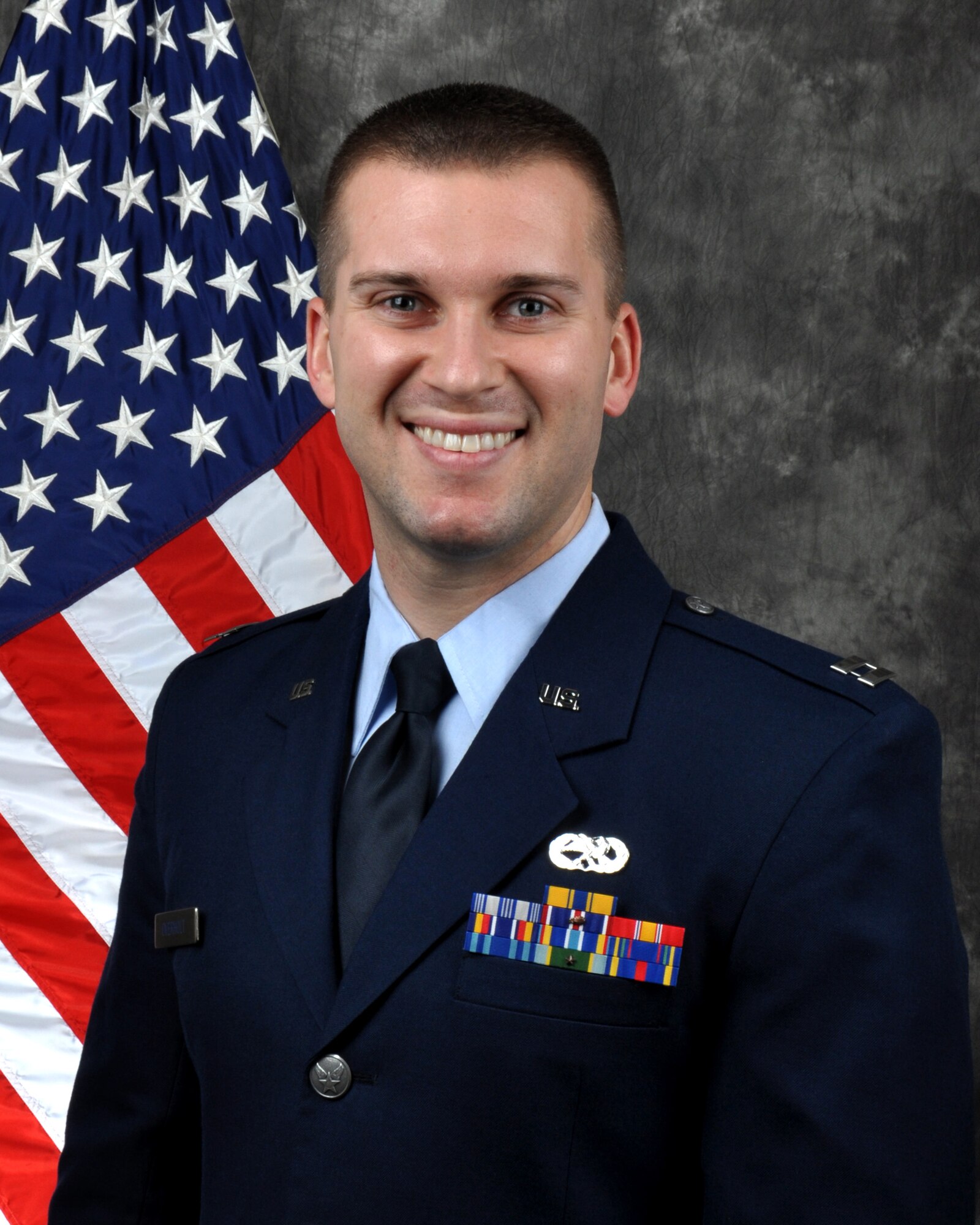 Capt. Tyler Overholt, 445th Maintenance Group quality assurance officer in charge, is the 445th Airlift Wing Company Grade Officer of the Quarter, fourth quarter.