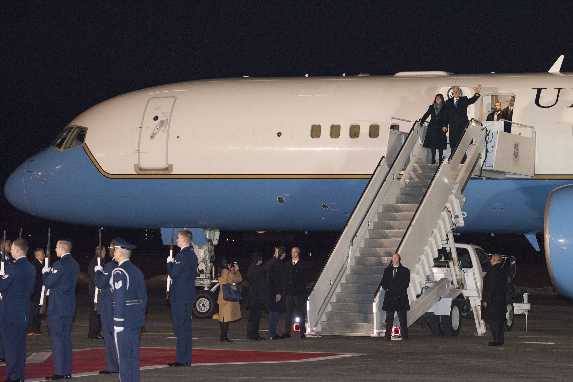 Vice President of the United States Michael R. Pence, accompanied by his wife Karen, disembarks Air Force Two upon arriving at Yokota Air Base, Japan, Feb. 6, 2018.