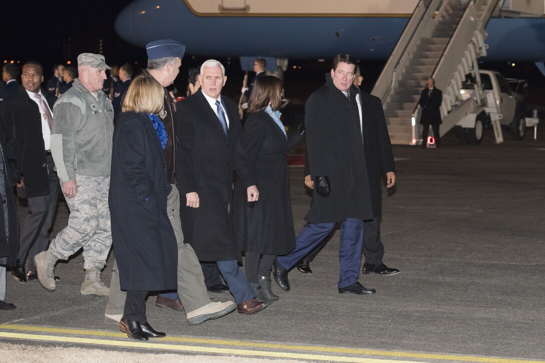 Vice President of the United States Michael R. Pence walks with Yokota leadership after his arrival to Yokota Air Base, Japan, Feb. 6, 2018.