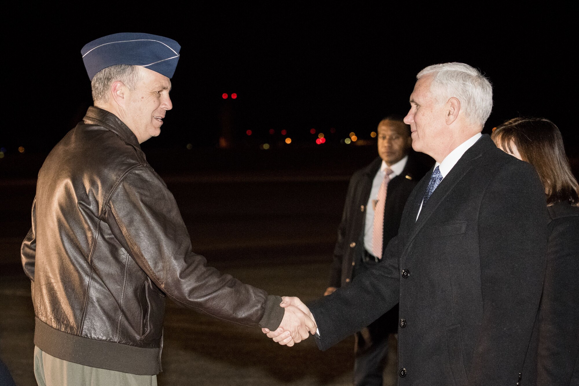 Lt. Gen. Jerry P. Martinez, Commander of United States Forces Japan greets Vice President of the United States Michael R. Pence during his arrival at Yokota Air Base, Japan, Feb. 6, 2018.