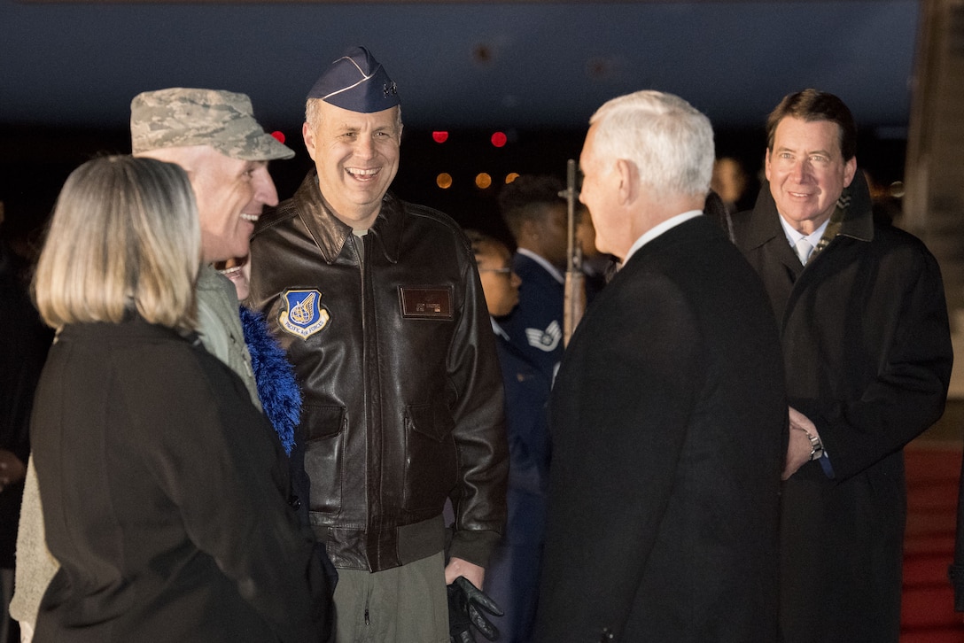 Vice President of the United States Michael R. Pence greets Lt. Gen. Jerry P. Martinez, (center) Commander of United States Forces Japan, Col. Kenneth E. Moss, 374th Airlift Wing commander and wife Molly during his arrival at Yokota Air Base, Japan, Feb. 6, 2018.