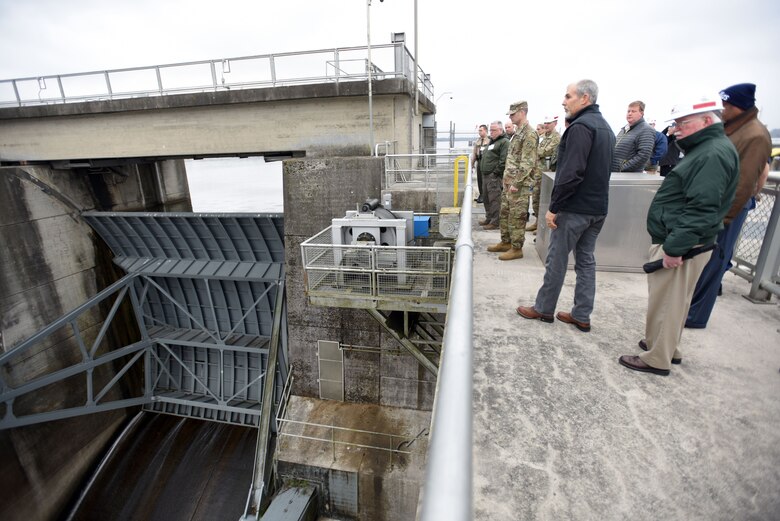 First responders take a look at the spillway gates at Old Hickory Dam on the Cumberland River during a tour during First Responders Day held at the project in Old Hickory, Tenn., Feb. 1, 2018. (USACE photo by Lee Roberts)