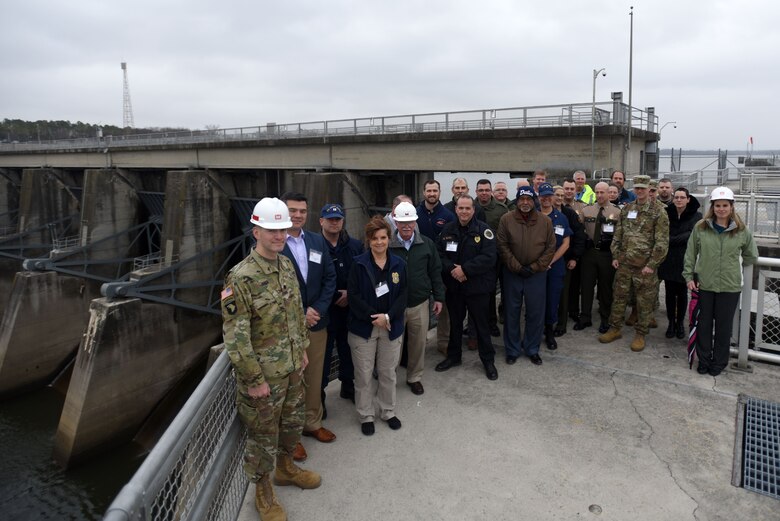 Participants of First Responders Day pose for a group photo on the lock wall of Old Hickory Dam during a tour of the project on the Cumberland River in Old Hickory, Tenn., Feb. 1, 2018. (USACE photo by Lee Roberts)