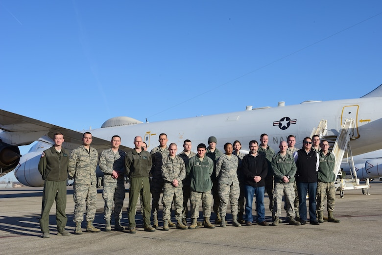 Members of the 595th Command and Control Group stand in front of an E-6B following a tour of the aircraft during the 625th Strategic Operations Squadron’s Deep Dive held at Offutt Air Force Base, Neb., Jan. 25, 2018. The Deep Dive is part of an effort by the group to give members of different squadrons insight into squadron-specific missions and an understanding of how their missions work together.