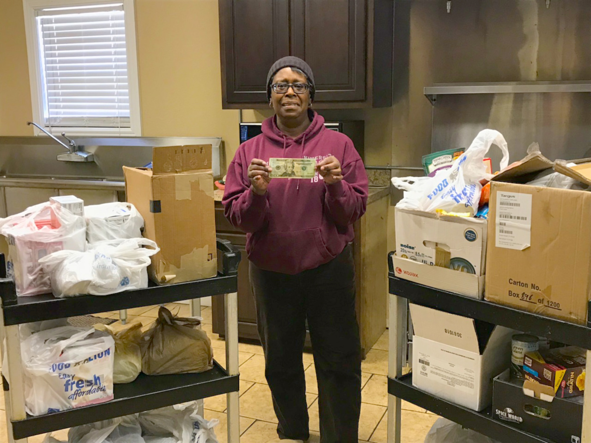 Jane Chrisman, secretary at the Mt. Zion Baptist Church, Tullahoma, displays food and monetary donations provided by the Arnold Air Force Base African-American Heritage Committee after a recent food drive. The drive was part of a Martin Luther King Jr. Remembrance Walk “Day of Service” event sponsored by the AAHC. More than 200 items were donated to the Mt. Zion Baptist Church Food Locker. (Courtesy photo)