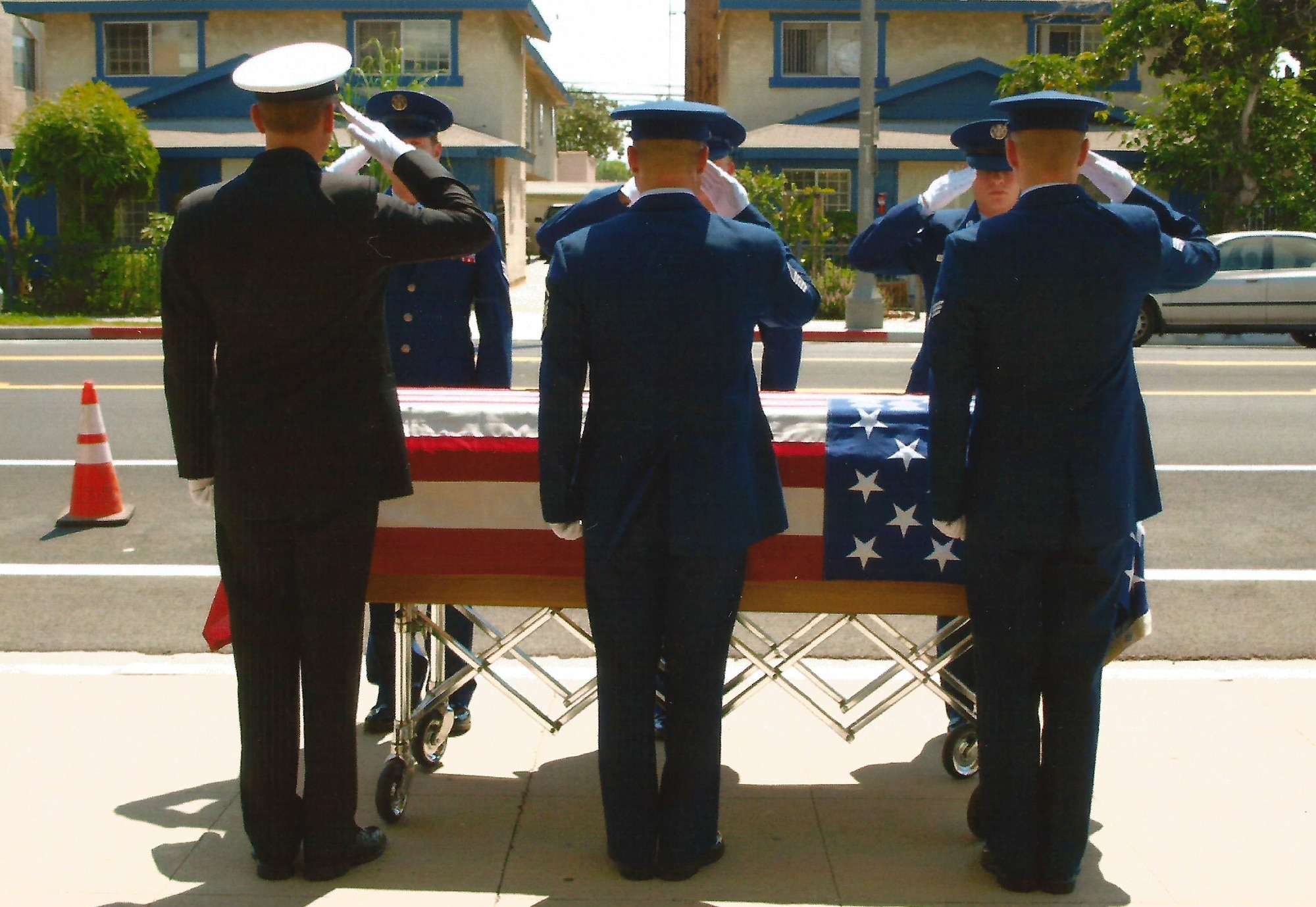 Roy Dean Baumgartner, a United States Navy Veteran (1945 - 1959), receives a final salute from his six grandsons currently serving in the military at his funeral in June, 2017.