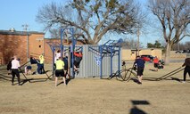 The Combat Cube is the newest addition to the Tinker Airman Leadership's School's PT curriculum. The Cube houses weights, battle ropes, resistance bands, and kettle bells, for example, to use for various exercises and the outside features pull-up stations and a rope climb, providing extensive combinations of PT possibilities to benefit the Airmen for years to come.