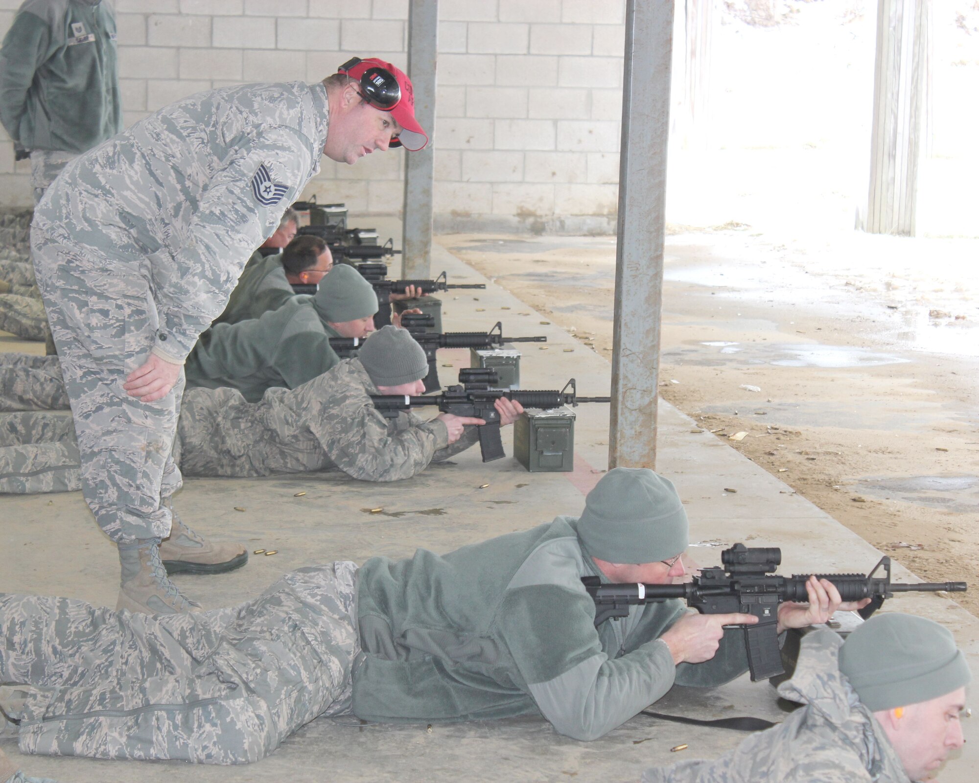 Tech. Sgt. Brad Vermeesch serves as a safety monitor while observing marksmanship training at Selfridge Air National Guard Base, Mich., Feb. 4, 2018. The Citizen-Airmen of the 127th Wing spent the February regularly scheduled drill focused on expeditionary skills training.