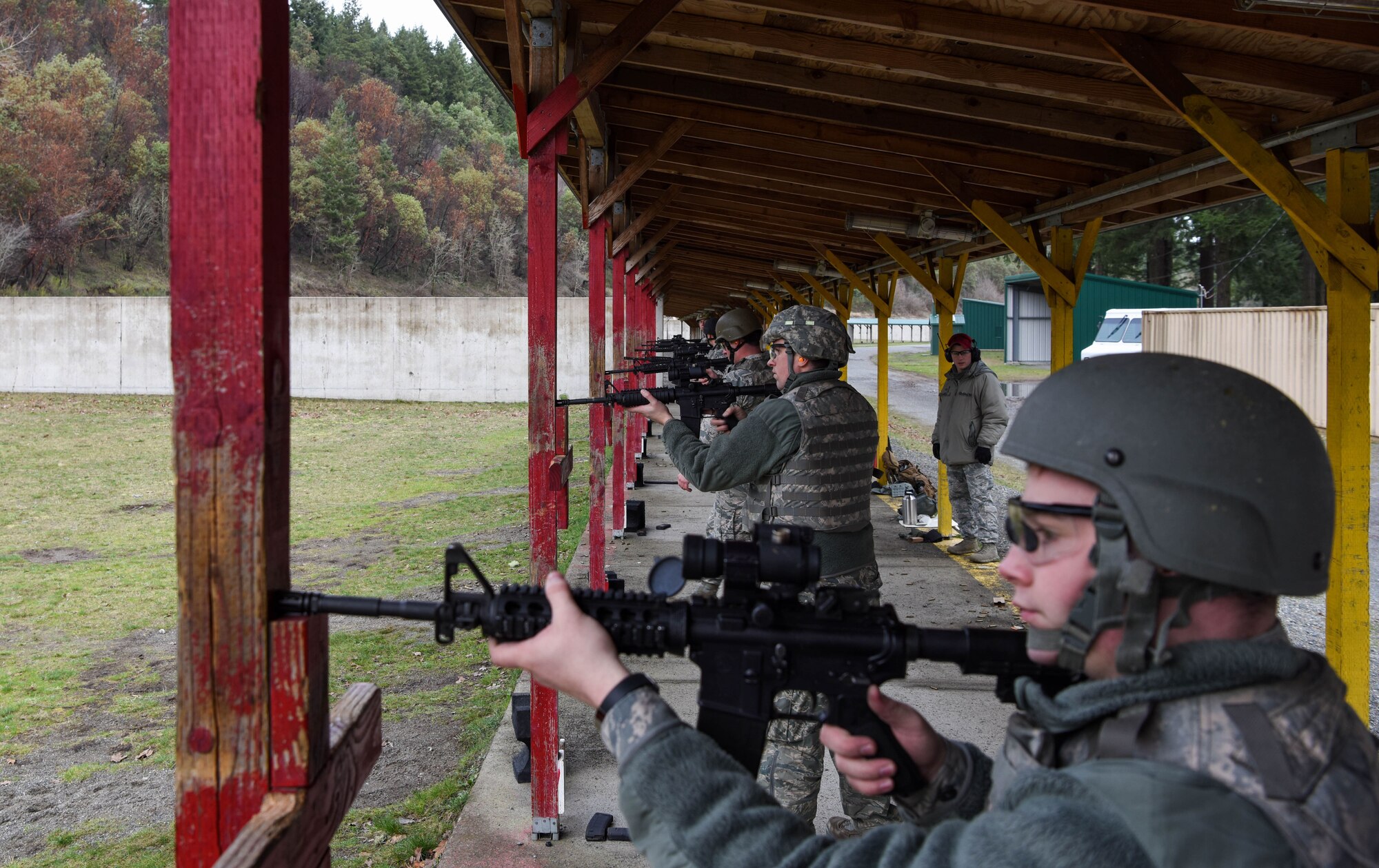 Team McChord Airmen prepare to fire for their M-4 carbine qualification training during the 62nd Security Forces Squadron’s Combat Arms Training and Maintenance class at Joint Base Lewis-McChord, Wash., Jan. 31, 2018.