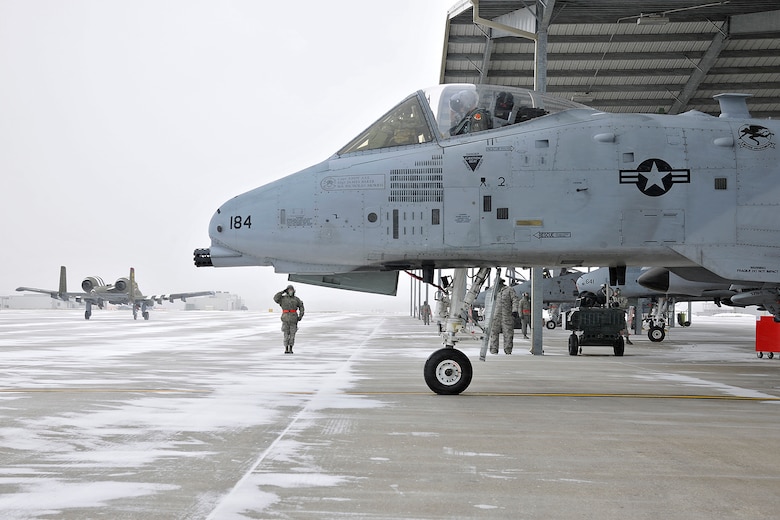 Members of the 127th Aircraft Maintenance Squadron, perform flight operations on the A-10 Thunderbolt II at Selfridge Air National Guard Base, Mich., Feb. 3, 2018. The maintenance and flight crews for the A-10 Thunderbolt II, perform their duties year round, regardless of weather conditions.