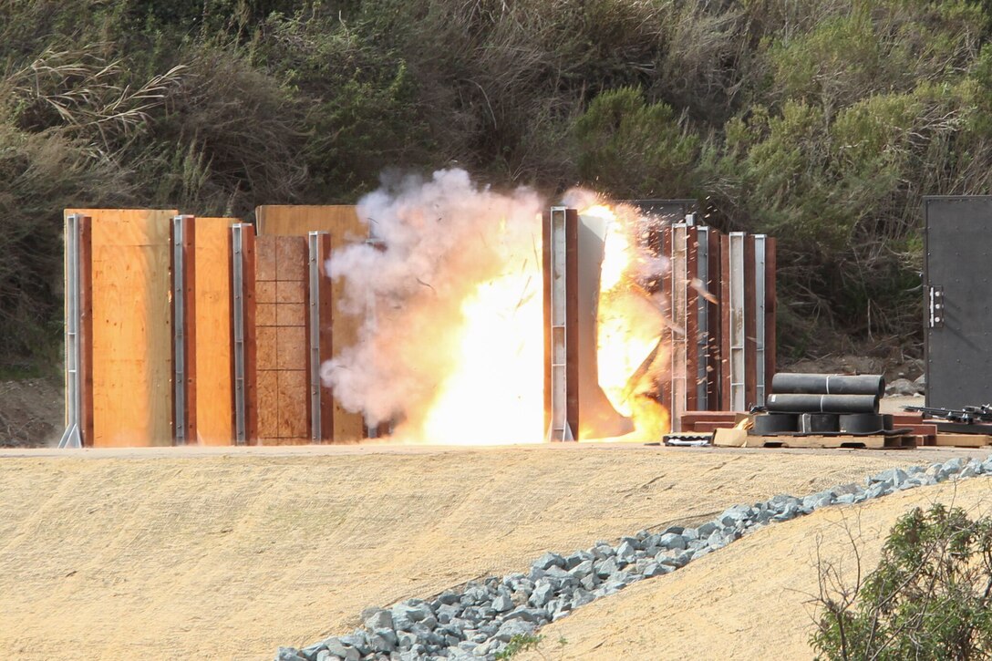 Camp Pendleton hosted Naval Surface Warfare Center Corona’s range systems department for explosive breach testing on Jan. 30, 2018. The explosive breach test was conducted to evaluate a new rail system that will be used as a training aid for Marine Corps Special Operations Command to set up multiple different scenarios for door breaching simulations.