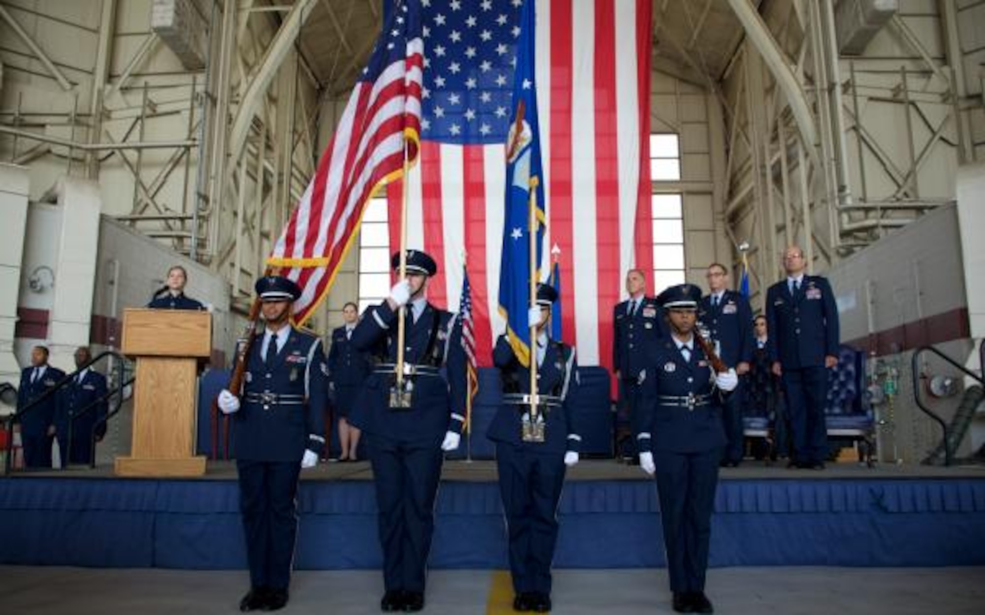 The Travis Honor Guard stands in formation before the change of command ceremony Aug. 8, 2015 at Travis Air Force Base, Calif. In the ceremony, Col. Raymond A. Kozak assumed command of the 349th Air Mobility Wing from Col. Matthew J. Burger. Kozak leads more than 3,100 combat-ready Citizen Airmen, flying and maintaining the C-17 Globemaster III, C-5 Galaxy and KC-10 Extender mobility aircraft. Col. Matthew J. Burger, outgoing 349th AMW commander, assumed duties in the Pentagon as the Programs and Requirements Division chief, Air Force Reserve Command. (U.S. Air Force photo/Senior Airman Madelyn Brown)