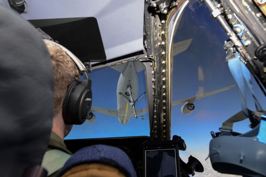 Capt. Nicholas Mortimer, 436th Airlift Wing Inspector General deputy chief of exercises and C-5M instructor aircraft commander, copilots a C-5M Super Galaxy as the crew prepares to receive fuel from an Ohio Air National Guard KC-135 Stratotanker in the skies above Kentucky. Simon Sinek joined the crew during the flight for his first air refueling mission. (U.S. Air Force photo by Staff Sgt. Aaron J. Jenne)