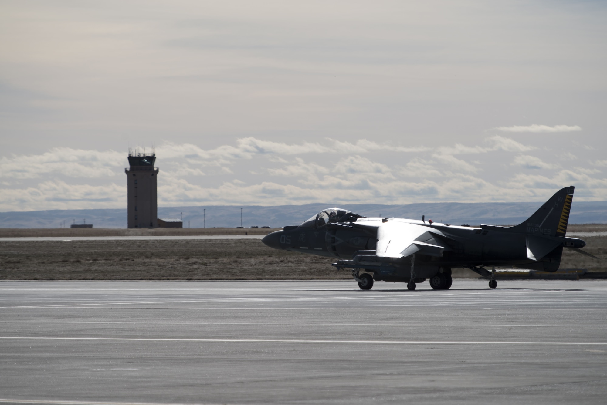 An AV-8B Harrier II taxies out to the runway Jan. 31, 2018, at Mountain Home Air Force Base, Idaho. The Marine Attack Squadron 542 worked alongside joint terminal attack controllers, F-15E Strike Eagles and A-10 Thunderbolt IIs. (U.S. Air Force Photo by Airman 1st Class JaNae Capuno)