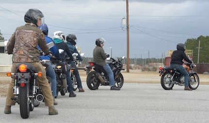 Students in the Basic Motorcycle Rider’s Course line up to run through an obstacle course Feb. 4 at Joint Base Charleston Naval Weapons Station.