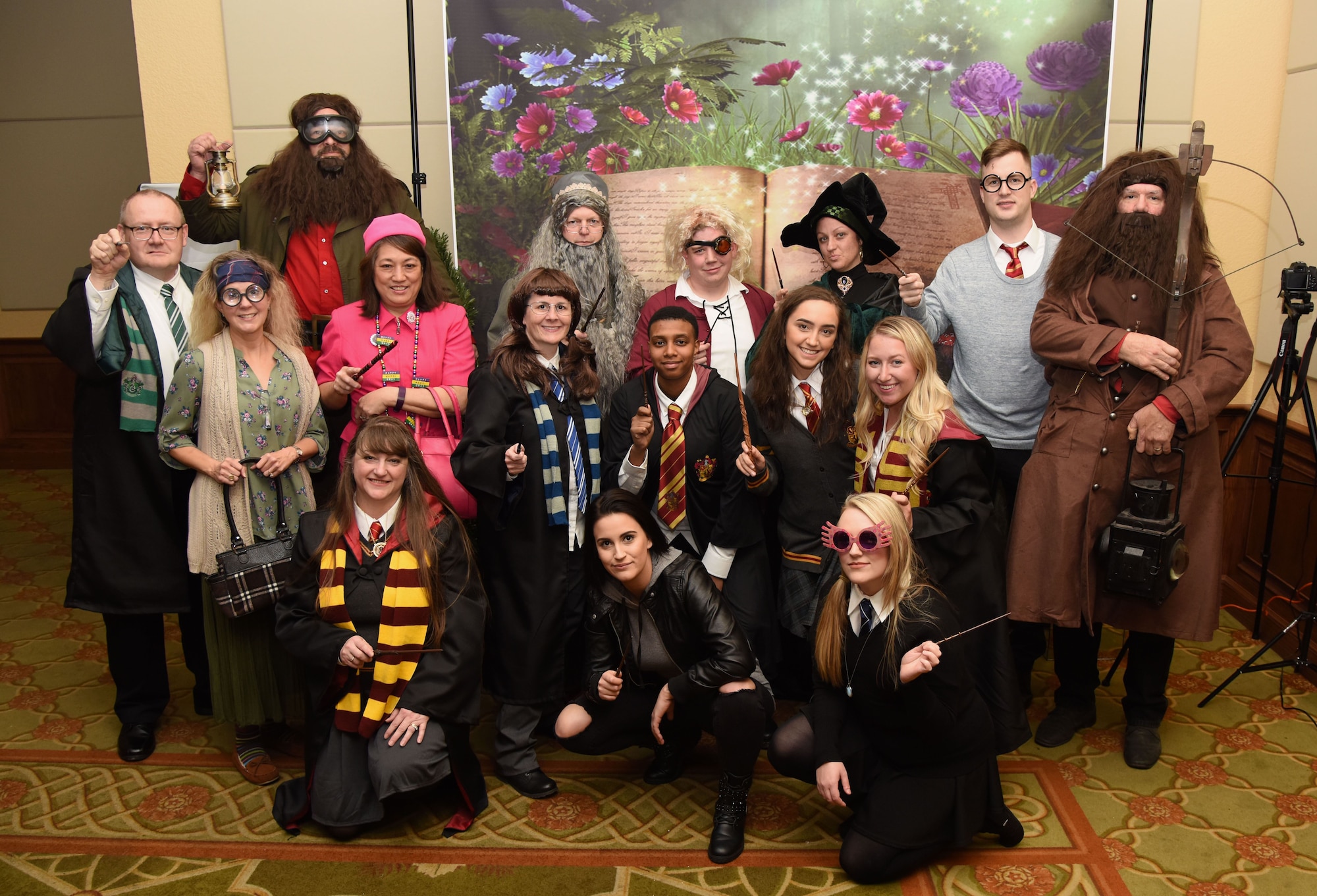 Members of the 81st Dental Squadron pose for a photo as they portray the cast of Harry Potter during the 30th Annual Krewe of Medics Mardi Gras Ball at the Bay Breeze Event Center Feb. 3, 2018, on Keesler Air Force Base, Mississippi. The Krewe of Medics hosts a yearly ball to give Keesler Medical Center personnel a taste of the Gulf Coast and an opportunity to experience a traditional Mardi Gras. The theme for this year's ball was Read It-Be It. The 81st DS won first place in the costume contest. (U.S. Air Force photo by Kemberly Groue)