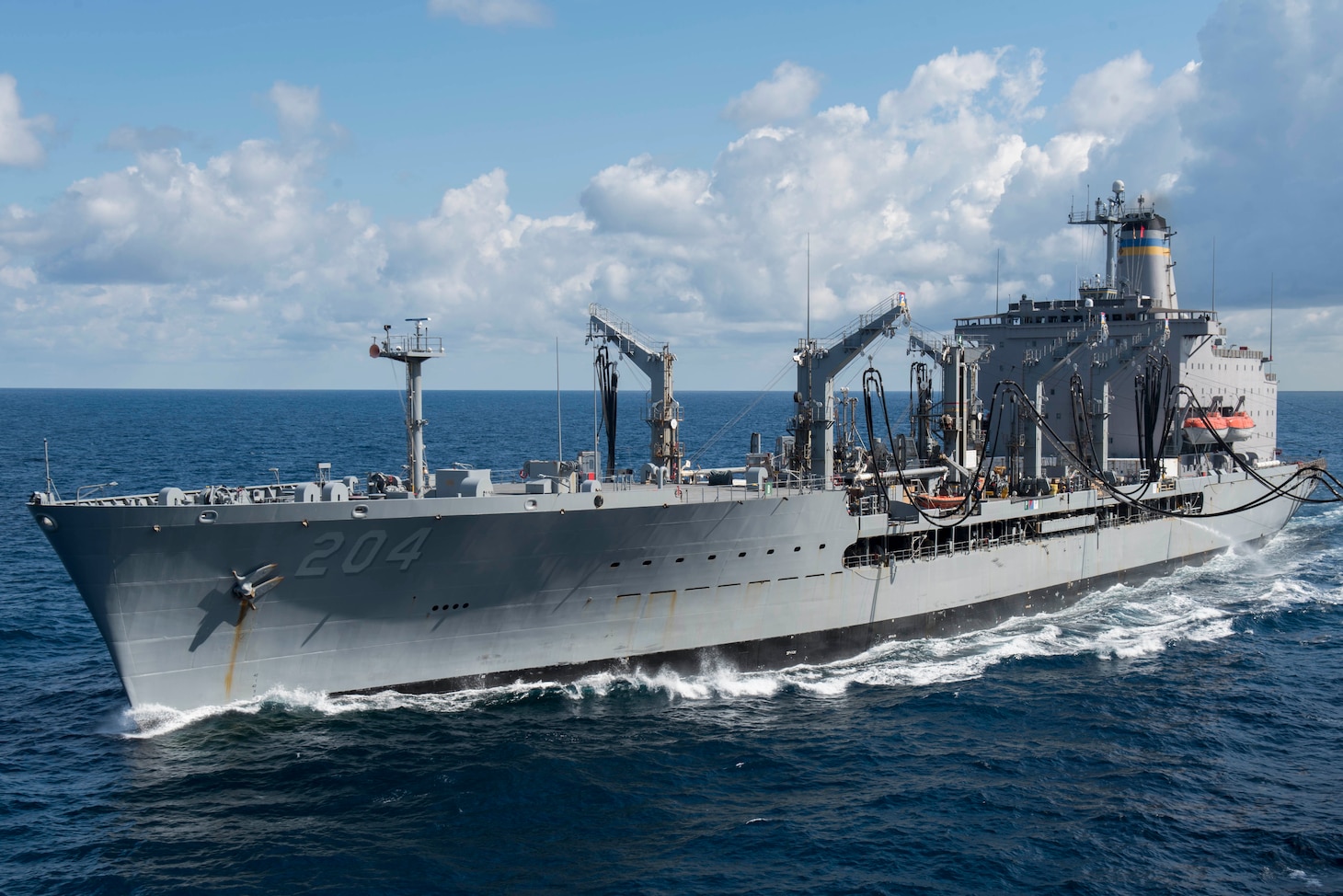 The Henry J. Kaiser-class replenishment oiler USNS Rappahannock (T-AO 204) fuels the amphibious assault ship USS Bonhomme Richard (LHD 6) during a replenishment-at-sea. Bonhomme Richard, flagship of the Bonhomme Richard Expeditionary Strike Group, is operating in the Indo-Asia Pacific region to enhance partnerships and be a ready-response force for any type of contingency.