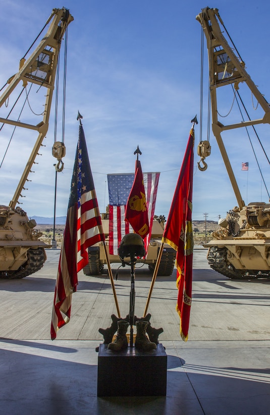 Flags are on displayed at a memorial for Staff Sgt. Enrico Antonio Rojo, held aboard the Marine Corps Air Ground Combat Center, Twentynine Palms, Calif., Jan. 21, 2018. Staff Sgt. Rojo was awarded a Navy and Marine Corps Medal for attempting to help the victim of a car accident on December 16, 2016. (U.S. Marine Corps photo by Pfc. Rachel K. Porter)