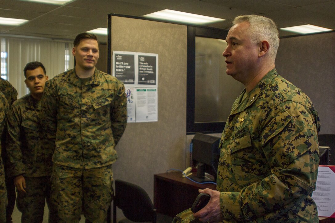 Col. Ricardo Martinez, chief of staff, Marine Air Ground Task Force Training Command, Marine Corps Air Ground Combat Center, speaks with Marines of the Fleet Assistance Program at the opening of the Tax Center aboard MCAGCC, Jan. 29, 2018. The Tax Center offers free assistance to Marines during Tax season. (U.S. Marine Corps photo by Pfc. Rachel K. Porter)