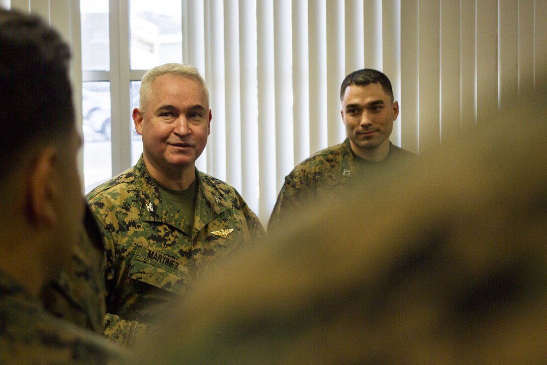 Col. Ricardo Martinez, chief of staff, Marine Air Ground Task Force Training Command, Marine Corps Air Ground Combat Center, speaks to Marines with the Fleet Assistance Program at the opening of the Tax Center aboard MCAGCC, alongside Capt. Adam LoCascio, officer in charge of the Tax Center, Legal Services Support Team, Headquarters Battalion, Jan. 29, 2018. The Tax Center offers free assistance to Marines during Tax season. (U.S. Marine Corps photo by Pfc. Rachel K. Porter)