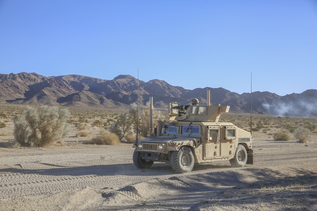 Marines with Combat Logistics Battalion 3 provide security from a Humvee during Integrated Training Exercise 2-18 aboard Marine Air Ground Combat Center, Twentynine Palms, Calif., Jan. 24, 2018.  The purpose of ITX is to create a challenging, realistic training environment that produces combat-ready forces capable of operating as an integrated MAGTF. (U.S. Marine Corps Photo by Lance Cpl. Conner Downey)