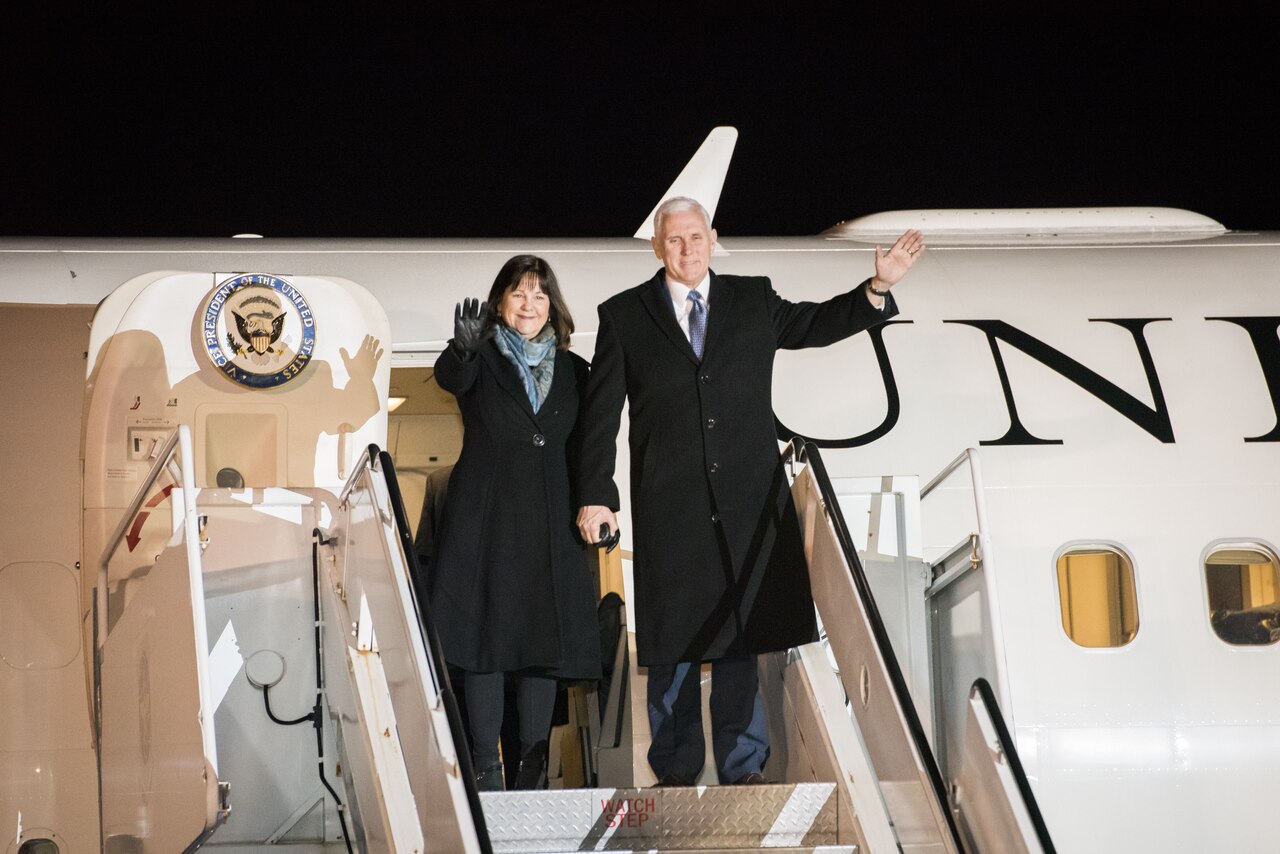 Vice President of the United States Michael R. Pence and wife Karen wave from Air Force II during his arrival at Yokota Air Base, Japan, Feb. 6, 2018.
