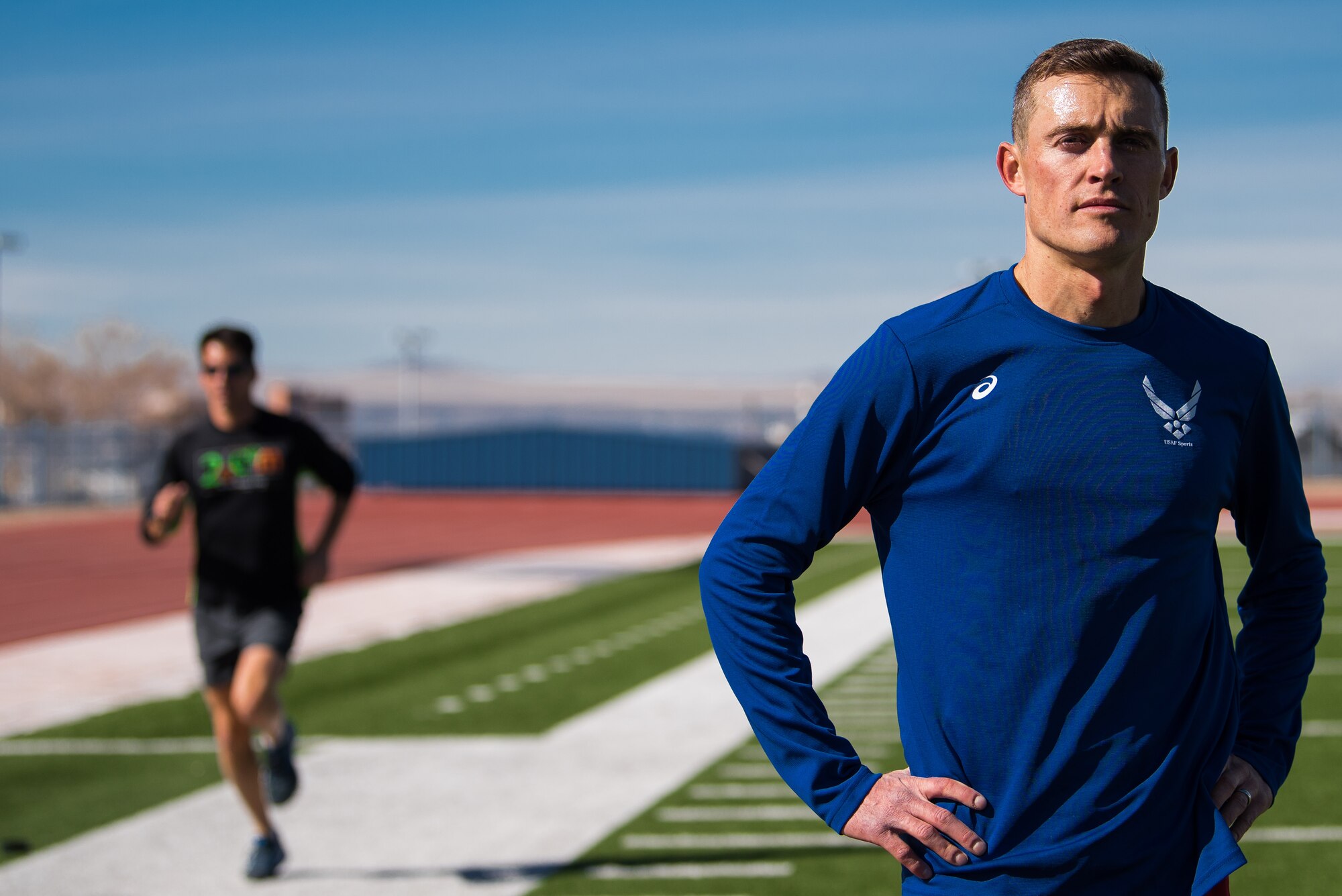 Capt. Kristopher Houghton, 377th Air Base Wing assistant staff judge advocate, poses during his training for a Conseil International du Sport Militaire (CISM) qualifying race at Milne Stadium in Albuquerque, N.M., Feb. 1, 2018. Houghton competed in the 2017 Marine Corps marathon and took fourth overall, but was the first active duty military member to finish. (U.S. Air Force photo by Staff Sgt. J.D. Strong II)