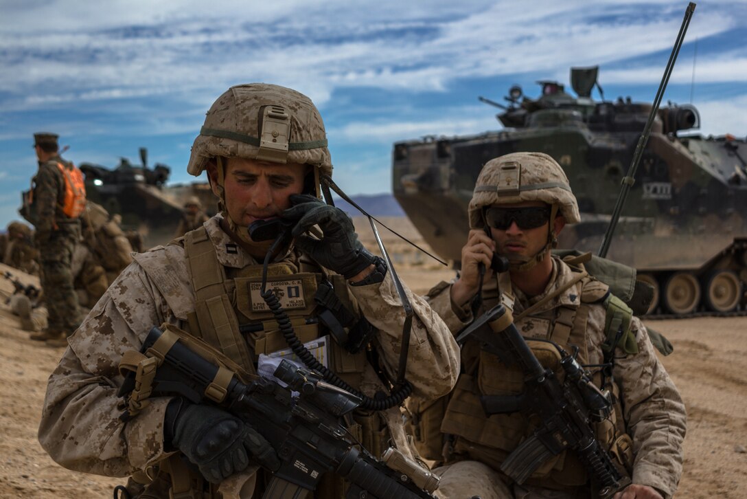 Capt. Charlie R. Cordova, company commander, 2nd Battalion, 3rd Marines, calls in for fire support during Integrated Training Exercise 2-18 at Range 220 aboard the Marine Corps Air Ground Combat Center Jan. 30, 2018. The purpose of the ITX is to create a challenging, realistic training environment that produces a combat-ready force capable of operating as an integrated MAGTF. (U.S. Marine Corps photo by Pfc. Rachel K. Porter)