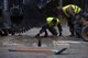 A U.S. Airman with the 435th Construction and Training Squadron training flight, and an Airman assigned to the 773rd Civil Engineer Squadron, checks the cuts made by the pavement team, during a Rapid Airfield Damage Repair training exercise on Ramstein Air Base, Germany, Jan. 25, 2018. The pavement teams were responsible for cutting the 18-24 inch deep concrete runway for other teams to clean out and repair. (U.S. Air Force photo by Senior Airman Devin M. Rumbaugh)