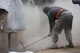 U.S. Air Force Staff Sgt. Antonio O’Campo, 773rd Civil Engineer Squadron electrical systems journeyman, mixes flowable fill concrete for a Rapid Airfield Damage Repair training exercise on Ramstein Air Base, Germany, Jan. 25, 2018. O’Campo was a part of the first class to be trained in the update RADR course. (U.S. Air Force photo by Senior Airman Devin M. Rumbaugh)