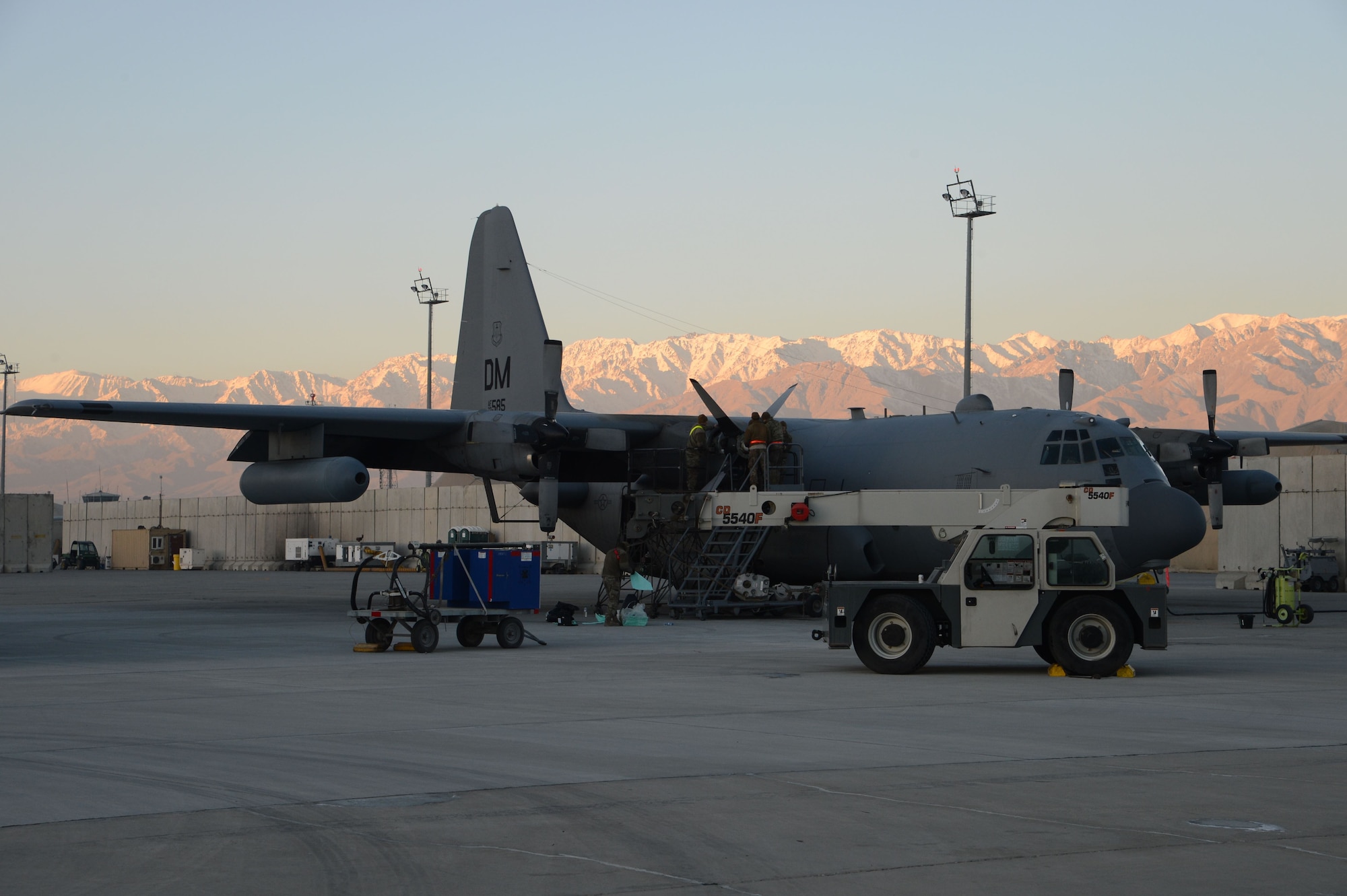 Airmen from the 455th Expeditionary Aircraft Maintenance Squadron perform maintenance on an EC-130H Compass Call Feb. 2, 2018 at Bagram Airfield, Afghanistan.