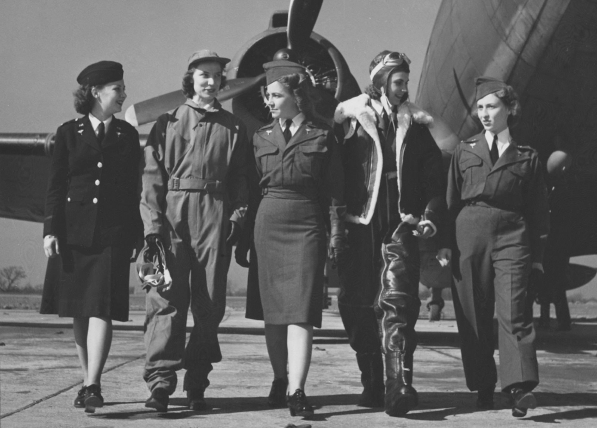 Members of the U.S. Army Flight Nurse Corps in 1943, displaying the various types of Army Nurse Corps uniforms. From left to right, 2nd Lt. Wilma Vinsant, in regulation blue winter uniform, Army Nurse Corps; 2nd Lt. Edith M. Roe; 2nd Lt. Ethel Guffey; 2nd Lt. Jane Orme, winter flying suit and 2nd Lt. Adela Besse, the gray flying suit with slacks. (Photo courtesy of the National Archives)
