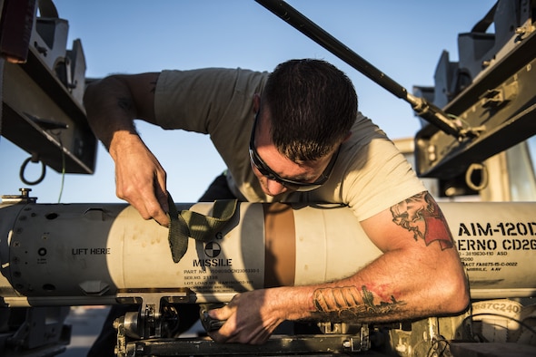 SSgt. Joshua Edwards, assigned to the 332d Expeditionary Maintenance Squadron, prepares munitions to be loaded on an F-15E Strike Eagle November 10, 2017 in Southwest Asia. Aircraft maintainers deployed with the 332d Air Expeditionary Wing enabled 134,916 combat flight hours in the year 2017 alone. (U.S. Air Force photo by Staff Sgt. Joshua Kleinholz)
