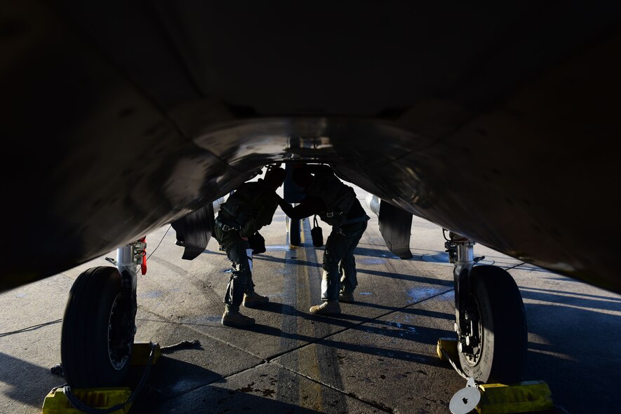 Maj. Wade Maulsby, 334th Fighter Squadron pilot, and 1st Lt. Mathew Clutts, 334th FS weapons systems operator, conduct a preflight check on an F-15E Strike Eagle, Feb. 5, 2018, at Seymour Johnson Air Force Base, North Carolina. Maulsby is the Air Combat Command nominee for the Colonel James Jabara Award for Airmanship, an award reserved for a U.S. Air Force Academy graduate whose accomplishments demonstrate superior performance in fields directly involved with aerospace vehicles. (U.S. Air Force photo by Airman 1st Class Kenneth Boyton)