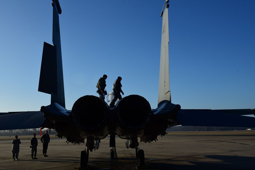 Maj. Wade Maulsby, 334th Fighter Squadron pilot, and 1st Lt. Mathew Clutts, 334th FS weapons systems operator, conduct a preflight check on an F-15E Strike Eagle, Feb. 5, 2018, at Seymour Johnson Air Force Base, North Carolina. Maulsby is the Air Combat Command nominee for the Colonel James Jabara Award for Airmanship, an award reserved for a U.S. Air Force Academy graduate whose accomplishments demonstrate superior performance in fields directly involved with aerospace vehicles. (U.S. Air Force photo by Airman 1st Class Kenneth Boyton)