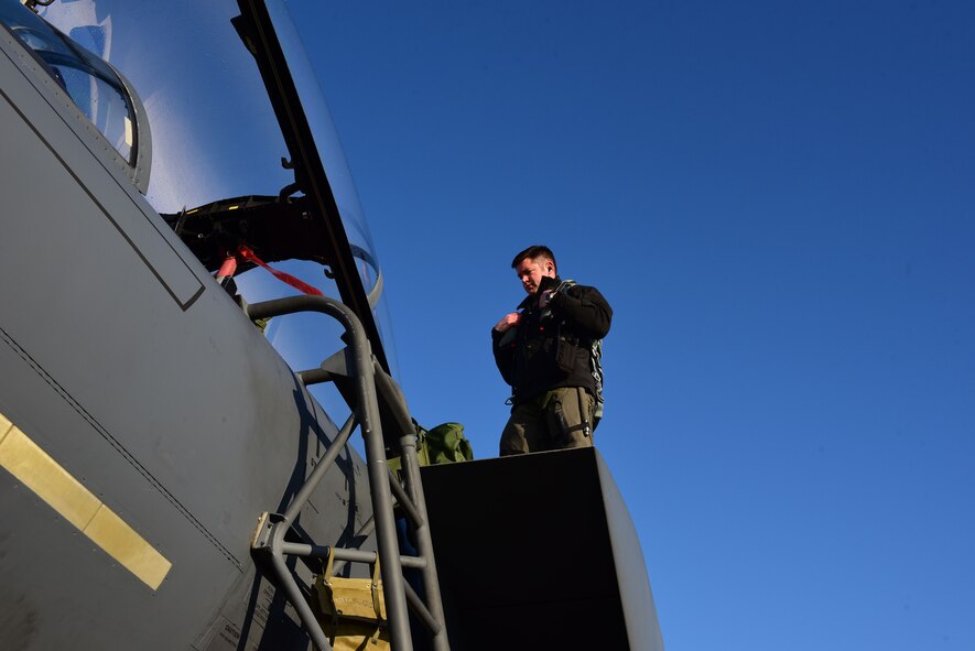 Maj. Wade Maulsby, 334th Fighter Squadron pilot, and 1st Lt. Mathew Clutts, 334th FS weapons systems operator, conduct a preflight check on an F-15E Strike Eagle, Feb. 5, 2018, at Seymour Johnson Air Force Base, North Carolina. Maulsby is the Air Combat Command nominee for the Colonel James Jabara Award for Airmanship, an award reserved for a U.S. Air Force Academy graduate whose accomplishments demonstrate superior performance in fields directly involved with aerospace vehicles. (U.S. Air Force photo by Airman 1st Class Kenneth Boyton)