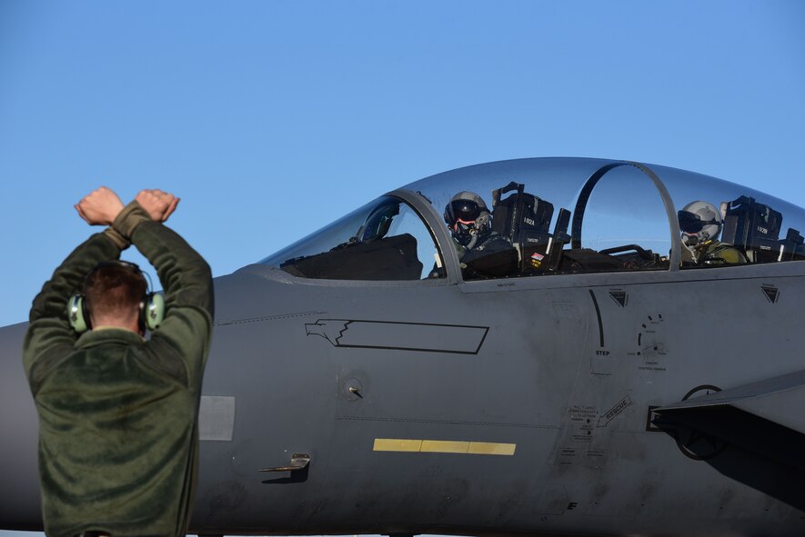 Maj. Wade Maulsby, 334th Fighter Squadron pilot, and 1st Lt. Mathew Clutts, 334th FS weapons systems operator, taxi before flight in an F-15E Strike Eagle, Feb. 5, 2018, at Seymour Johnson Air Force Base, North Carolina. Maulsby is the Air Combat Command nominee for the Colonel James Jabara Award for Airmanship, an award reserved for a U.S. Air Force Academy graduate whose accomplishments demonstrate superior performance in fields directly involved with aerospace vehicles. (U.S. Air Force photo by Airman 1st Class Kenneth Boyton)