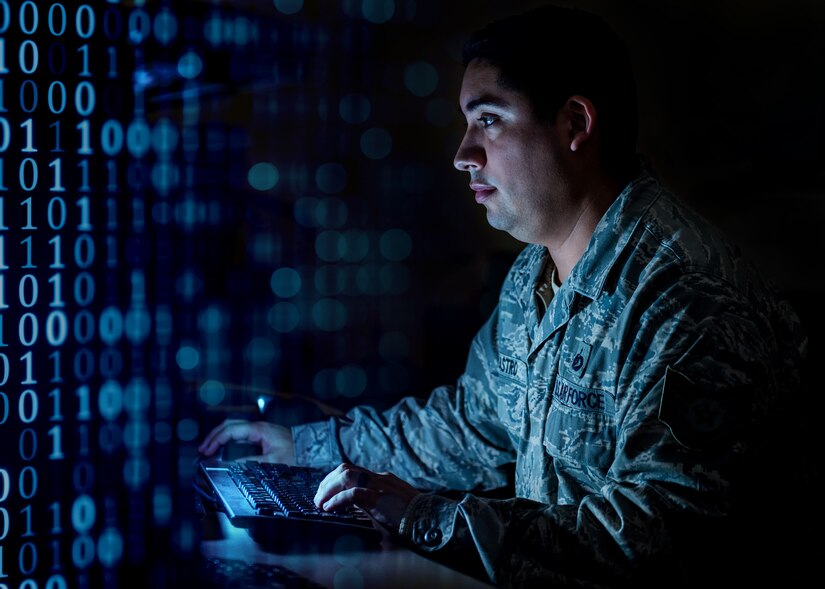 U.S. Air Force Tech. Sgt. Luis Castro, Air Combat Command, Command Center NCO in charge of command and control operations reports, works at the ACC Command Center, Joint Base Langley-Eustis, Va., Feb. 1, 2018.