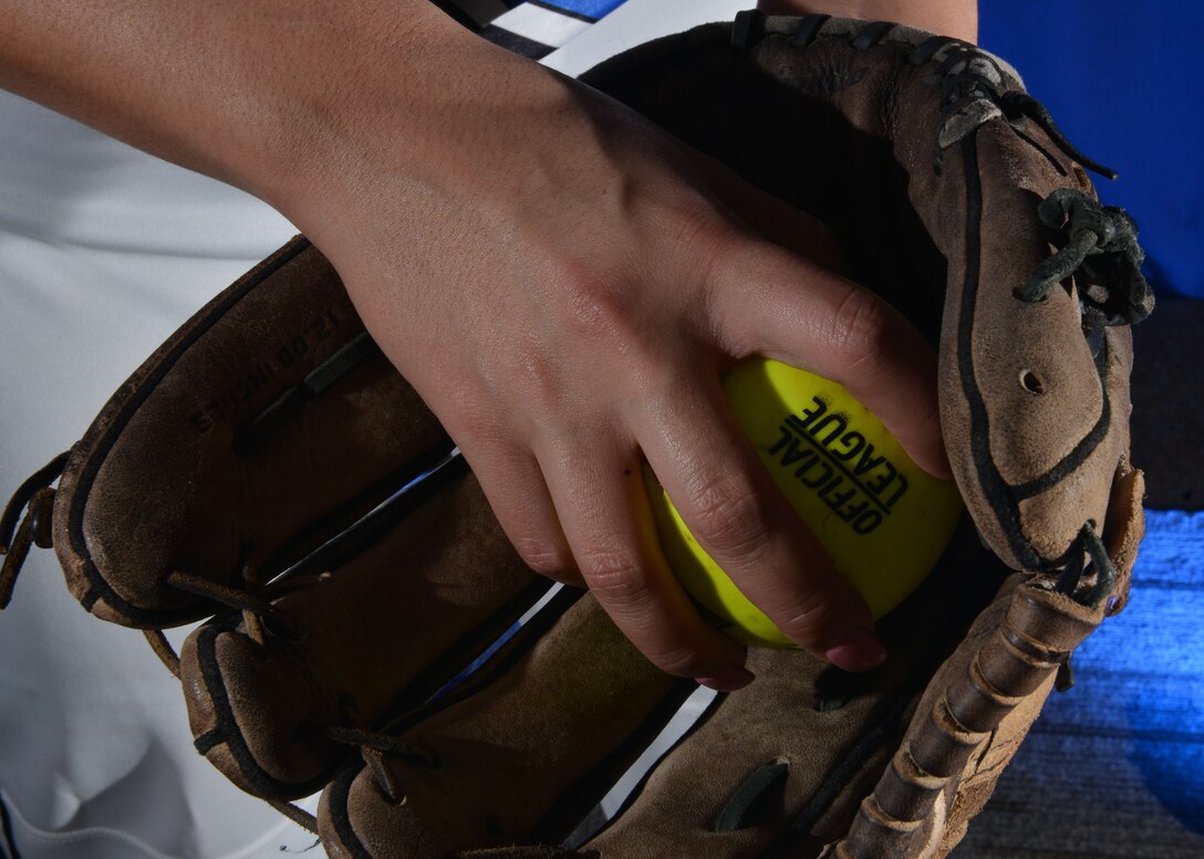 U.S. Air Force Airman 1st Class Daniella Cortez, 633rd Force Support Squadron commander support staff holds her glove and ball at Joint Base Langley-Eustis, Va., Jan. 31, 2018.